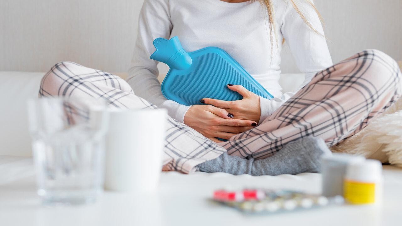 Can menstrual cramps be a sign of an underlying health condition, and when should medical attention be sought?