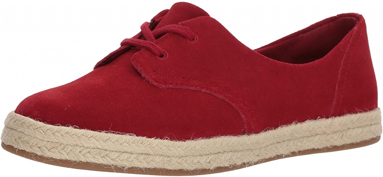 Clarks Women's Azella Jazlynn Sneaker fabric or suede upper sits on top of a low-platform
