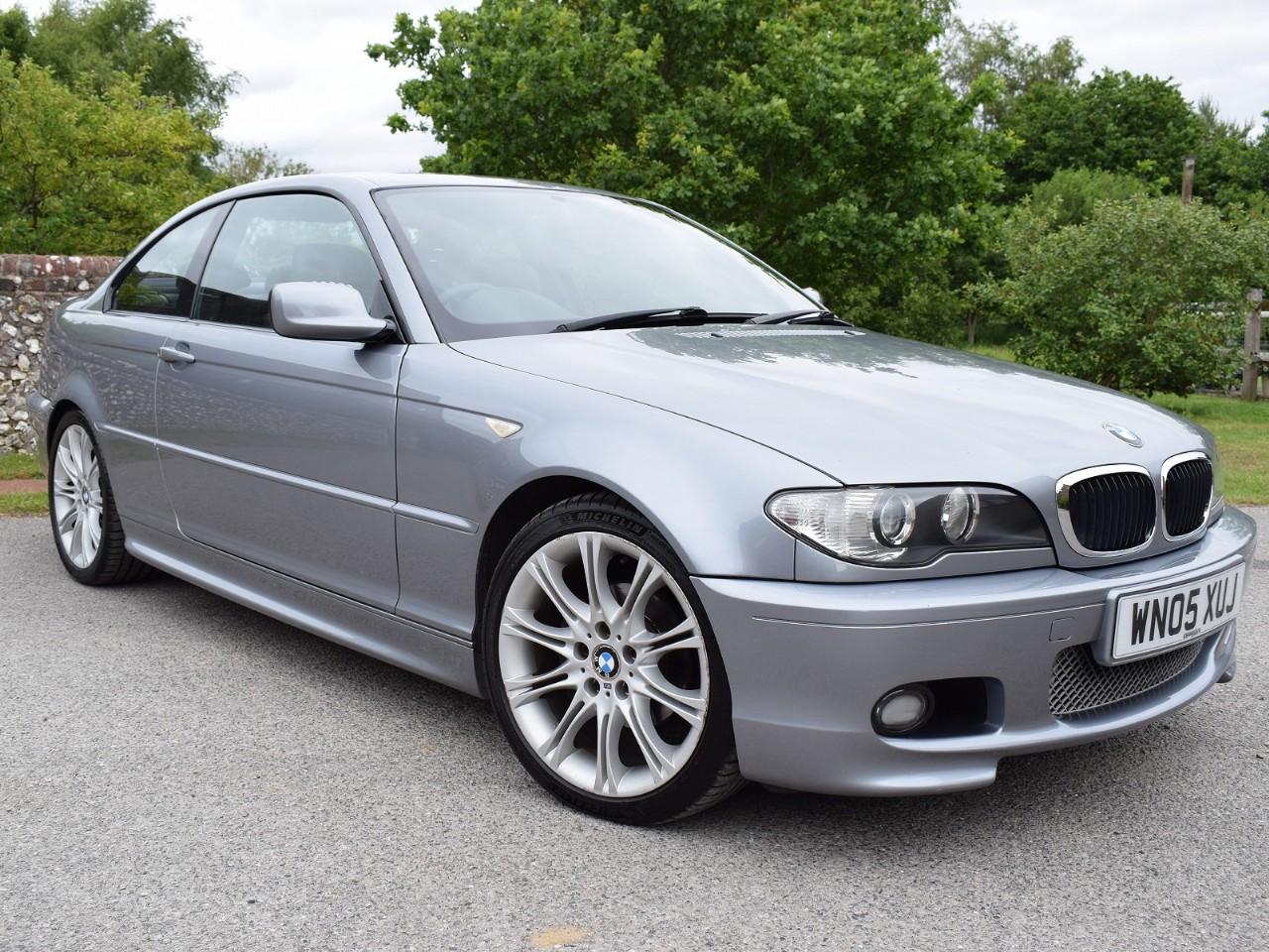 For a BMW 318Ci, the recommended oil capacity