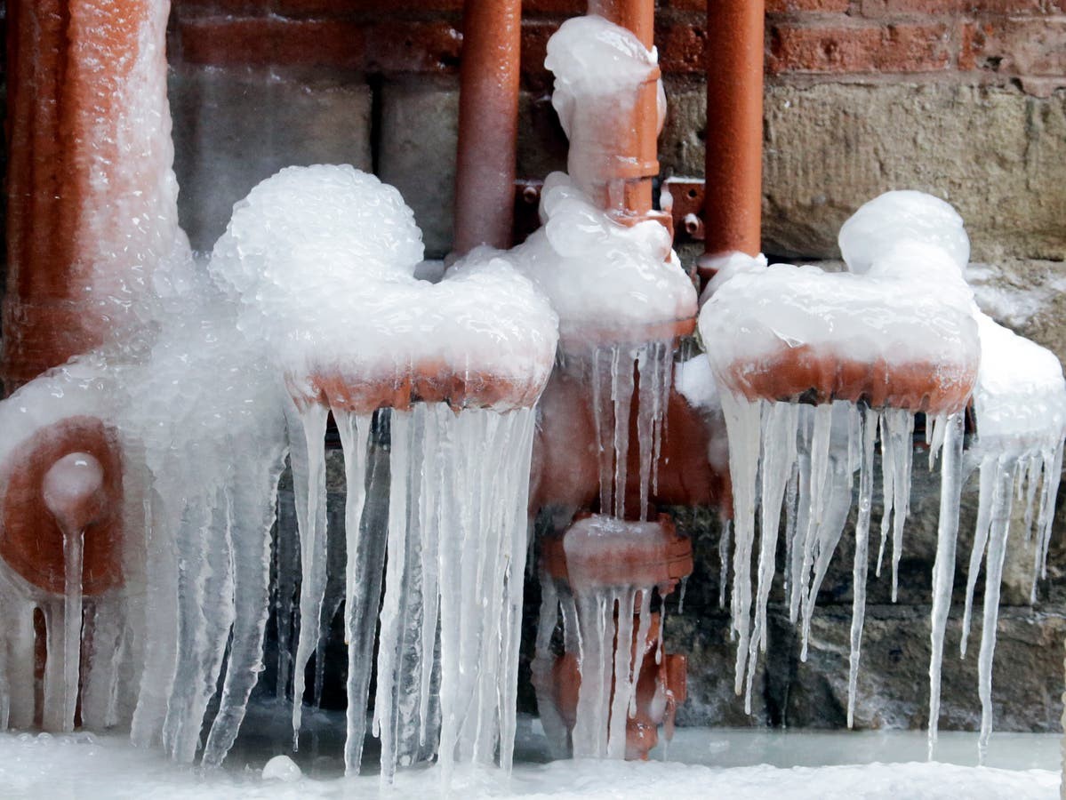 How can I prevent my pipes from freezing in cold weather, and what should I do if they do freeze?