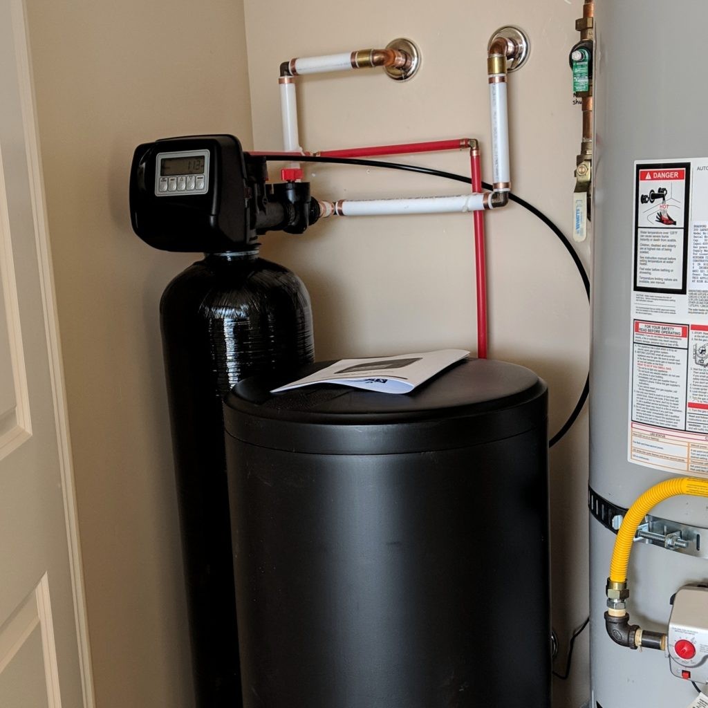 How do I choose the right size and type of water softener for my home?