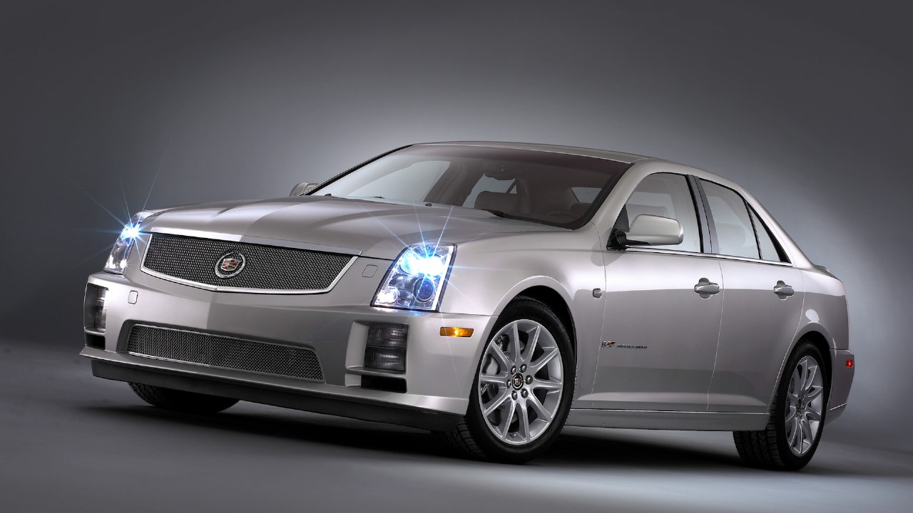 The recommended oil type and capacity for a Cadillac STS