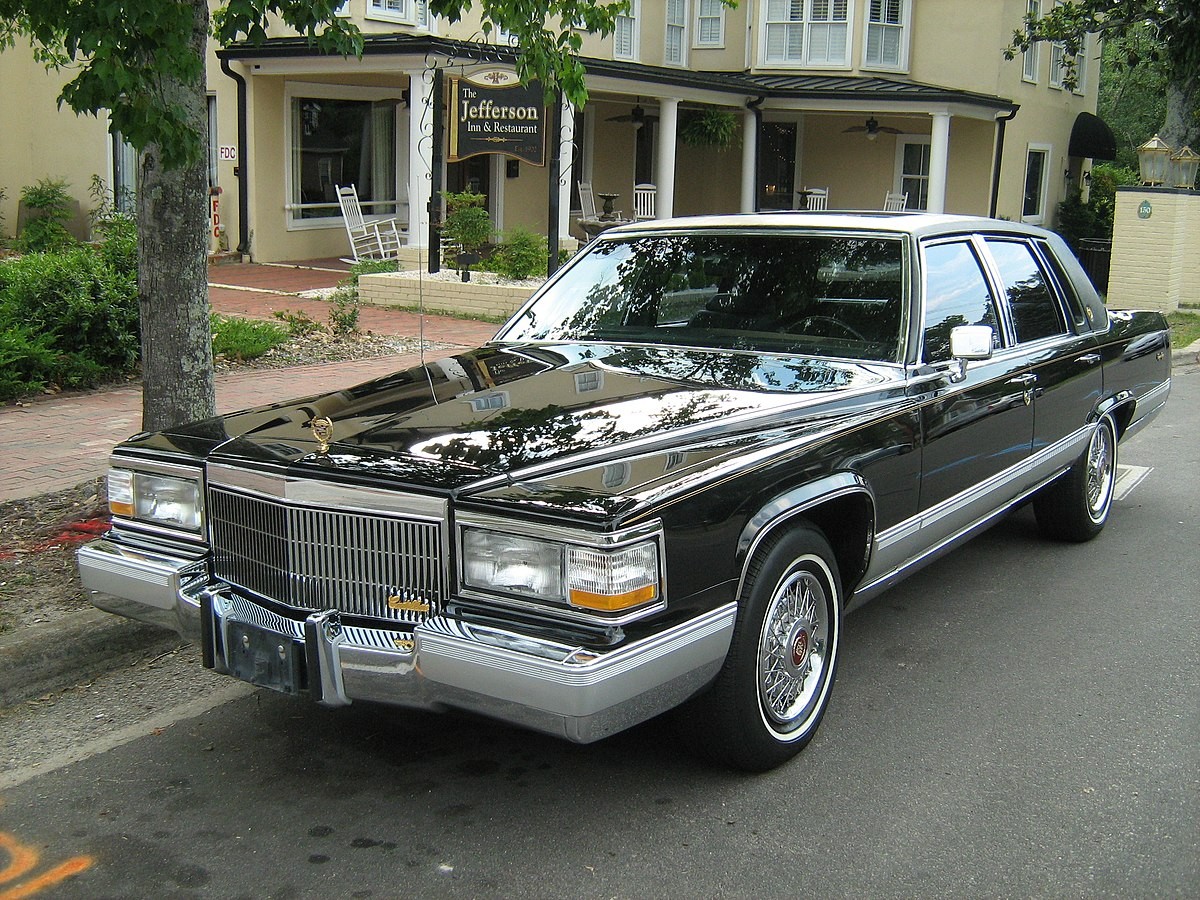 The type of oil and the amount required for a Cadillac Brougham
