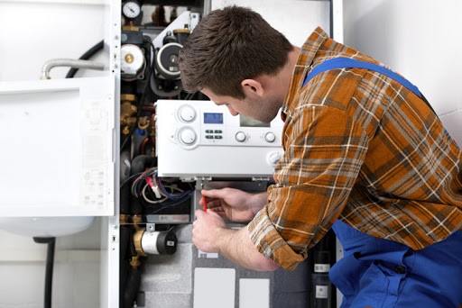 What are some common problems with tankless water heaters, and how can they be fixed?