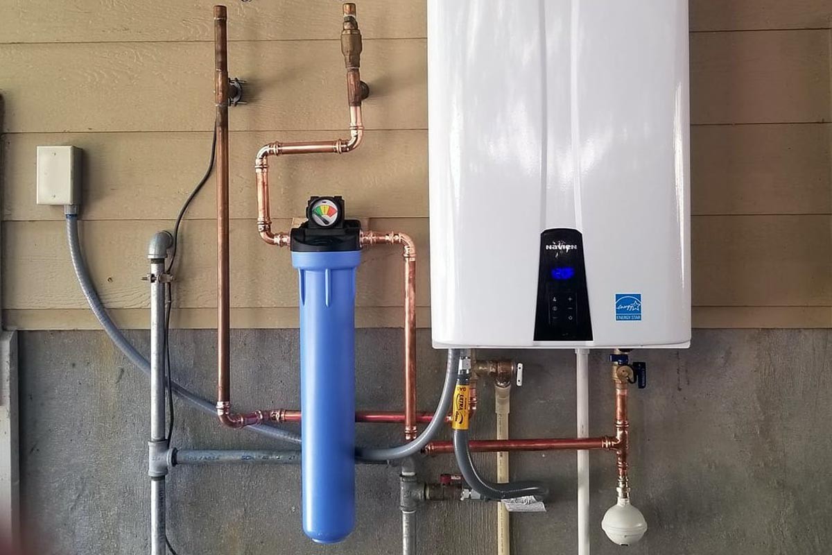 What are the benefits of installing a tankless water heater, and how does it work?